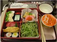 An airline meal served on a partition tray