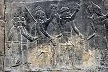 Relief depicting Assyrian soldiers and their prisoners