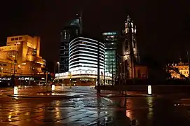 The hotel at night, Saint Nicholas' Church can be seen to the right