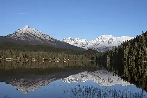 McGinnis (left), Mendenhall Towers, and Mt. Wrather reflected in Auke Lake