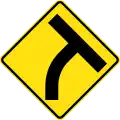 (W2-14) T-junction beyond a curve to right