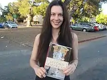 Michelle Moran with a copy of her fifth book, The Second Empress