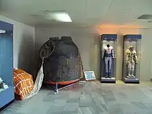 Soyuz 33 capsule with parachute, and Ivanov's spacesuits