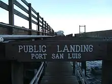 Port San Luis Pier. The pier also has a live fish market and harbor patrol office.