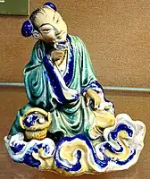 Ceramic statue of Tiên in a museum in Vietnam