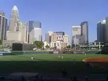 The view from left field, with the Charlotte skyline