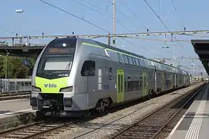 Silver train with green trim