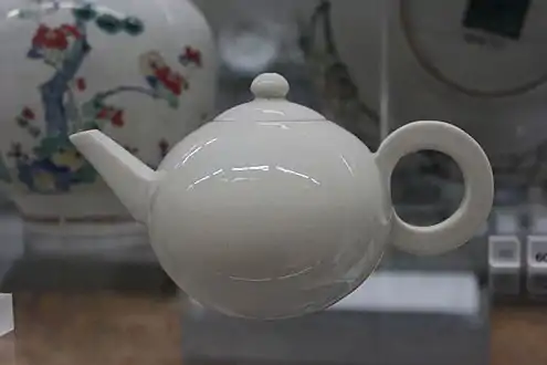 A white teapot from Dehua, ca. 1690-1720. The base is inscribed with the name of the Emperor Xuande, who reigned from 1426 to 1435, more than 250 years before the teapot was made. The use of earlier reign marks has a long history in China, much to the vexation of modern researchers, and was intended to indicate respect rather than to deceive. The teapot's bold geometric design anticipates the forms of European modernism by more than two centuries.