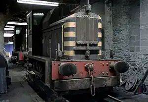 Class 01 01002 inside Holyhead Breakwater shed in early black livery. Withdrawn 01001 is just visible at the rear.