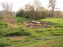 The ruins of a fourteenth-century house, possibly also the site of the former Baginton Castle