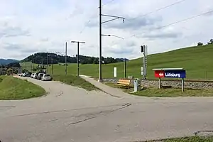 Station platform and small parking lot