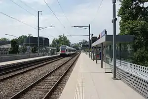 Two side platforms with two tracks between them