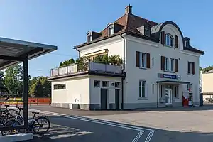 Two-story cream-colored building