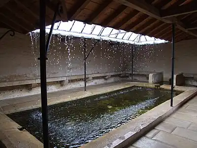 Functioning compluvium roof in the 1865 Lavoir (public laundry-house), Baigneux-les-Juifs, France