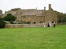 Image shows the exterior of Bailiffscourt, in its current use as a Hotel and Spa