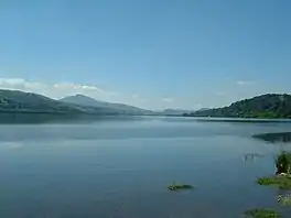 A large lake surrounded by hills