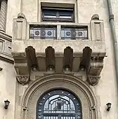 Romanian Revival balcony of the Gheorghe Petrașcu House in the Roman Square, Bucharest, Romania