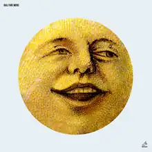 The cover art depicts a smiling yellow moon in the centre, with a light blue background surrounding it
