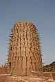 Minaret with protruding horizontal wooden sticks of the mosque of Bani, Burkina Faso, 2007