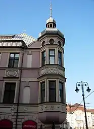 Bay window with solar motif