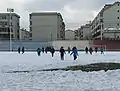 Students at Baotou Foreign Languages School playing soccer in the snow