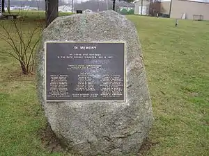 bronze plaque listing the people's names who died during the disaster (with the exception of the Kehoes), fixed to a large boulder