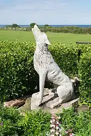 Wolf sculpture marking the spot overlooking where St Edmund supposedly landed in 855