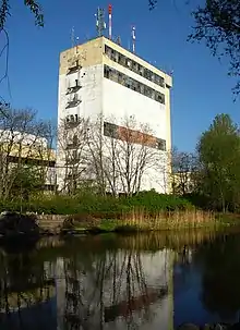 View of the factory building from the Five ponds valley ("Dolina Pięciu Stawów w Bydgoszczy")