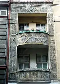 balconies with bas-reliefs