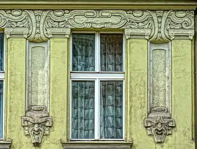 Art Nouveau friezes and gargoyles