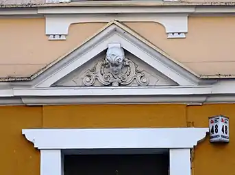 Adorned pediment