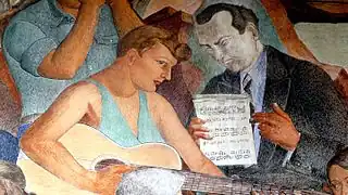 Labaudt's daughter Yliane plays a guitar at Baker Beach (north end of east wall)