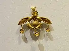The Malia Pendant, an iconic Minoan jewel; 1700-1600 BC; gold; width: 4.6 cm; from Chrysolakkos (gold pit) complex at Malia; Archaeological Museum of Heraklion
