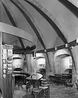 The bar ±1970 on ground floor with a rib vault and cannon holes along the walls in niches. (Where you see tables on the picture)