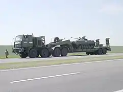 MZKT-74295 transporting a BMP-2