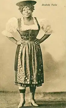 Fields around 1910 in a German folk outfit