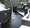 Watergate entry of Brook into bend of River Derwent, Matlock