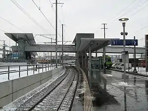 Wet, snow-covered platforms