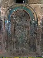 One of the seven life-size saints carved into the wall of the Church of Bet Golgotha, Lalibela, 15th century (traditionally believed to have been made during the reign of Gebre Mesqel Lalibela)