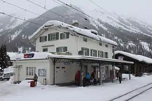 Three-story building with gabled roof