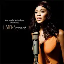 A woman is standing against a dark background. She wears a blouse and a headband while she sings with a microphone she has in front of her. The words "Music from the Motion Picture", "Dreamgirls", "Listen" and "Beyoncé" are written next to her image.