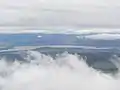 A bird's eye view of the Oravská priehrada reservoir (from Babia Góra National Park in Poland)