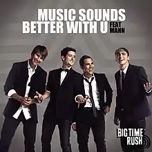 A image of the four members of American band Big Time Rush; from left to right: James Maslow, Logan Henderson, Kendall Schmidt, and Carlos PenaVega. Above them reads "Music Sounds Better with U" in all-caps and a white font, followed by "Feat Mann" in a smaller, all-caps and black font. In the bottom right corner is the band's official logo in black and white.