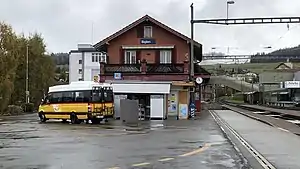 Two-story station building with gabled roof