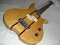 Electric bass guitar with bird's eye maple top