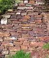 23. Ideal example of a dry stone wall. Built with stone broken on the spot. Hatzenporter Burg Bischofsteiner