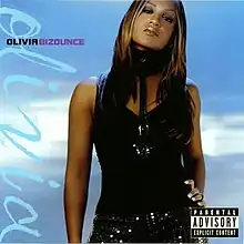 A woman with one hand on her hip and staring toward the audience. The woman is standing in front of a pale blue background. The word Olivia is written in light blue cursive font on the left side and the words Olivia and Bizounce are written in smaller font over it in black and pink respectively. The parental advisory (explicit content) is in the lower right hand corner of the image.