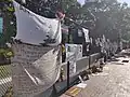 Banners covering the fence erected around Lafayette Square following the clearing of the park for a Trump photo op (2020)