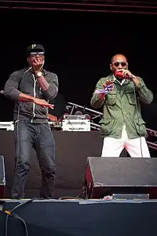 Members Kweli (left) and Yasiin Bey performing at the 2012 Ilosaarirock festival