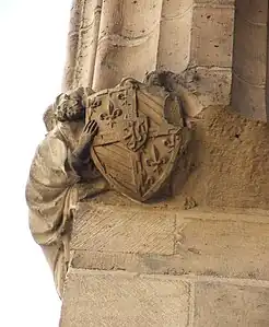 An angel carrying Jean sans Peur's coat of arms, in the large hall